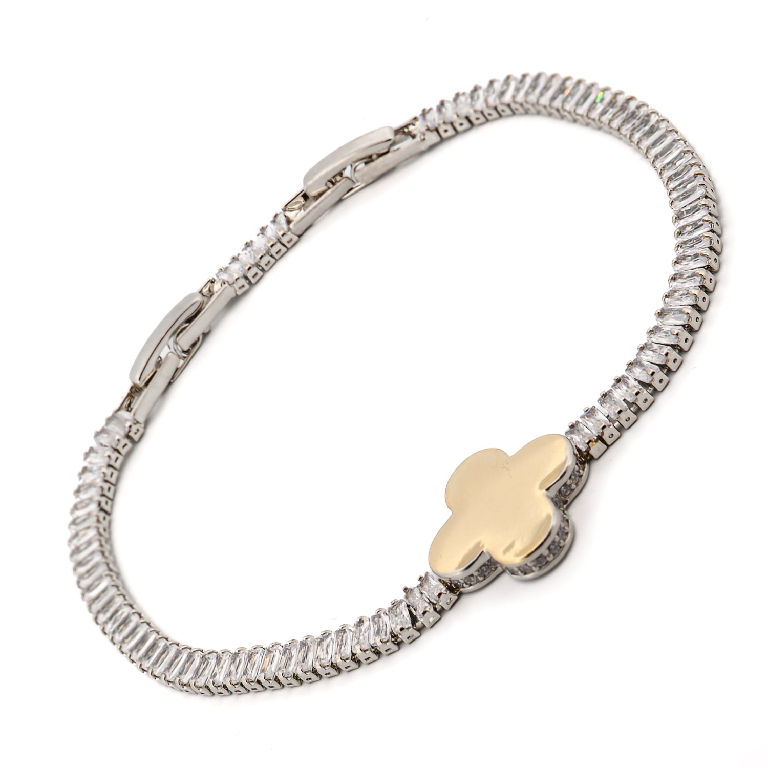 Sophisticated baguette diamond bracelet featuring a central gold clover charm, handmade