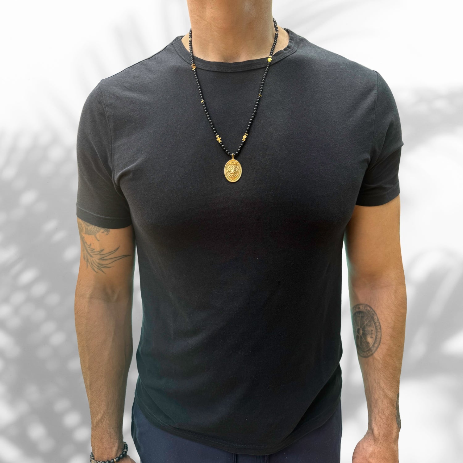 Unique men's necklace with 4mm black onyx stones and a striking 24k gold-plated lion pendant