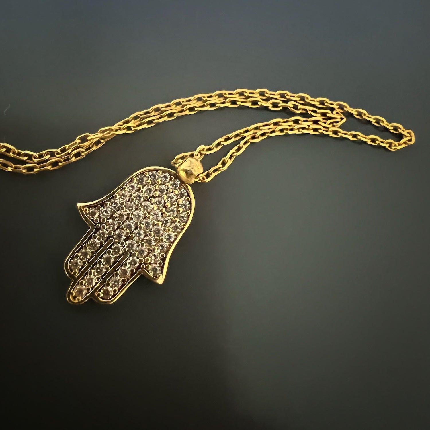 Hamsa Pendant Necklace - Discover the power of protection with this beautifully crafted Hamsa pendant necklace, available in sterling silver or gold plated.