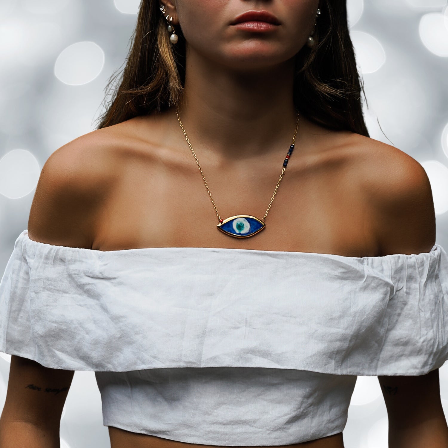 Artistic Jewelry - Model Wearing Lapis Lazuli and Coral Stones Necklace.