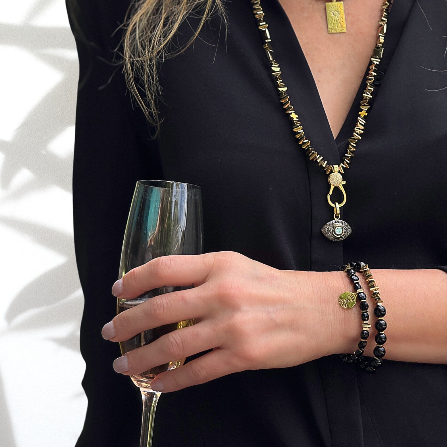 Elegance and Inspiration: Handcrafted Black Onyx Bracelet Set with Gold-Plated Charm