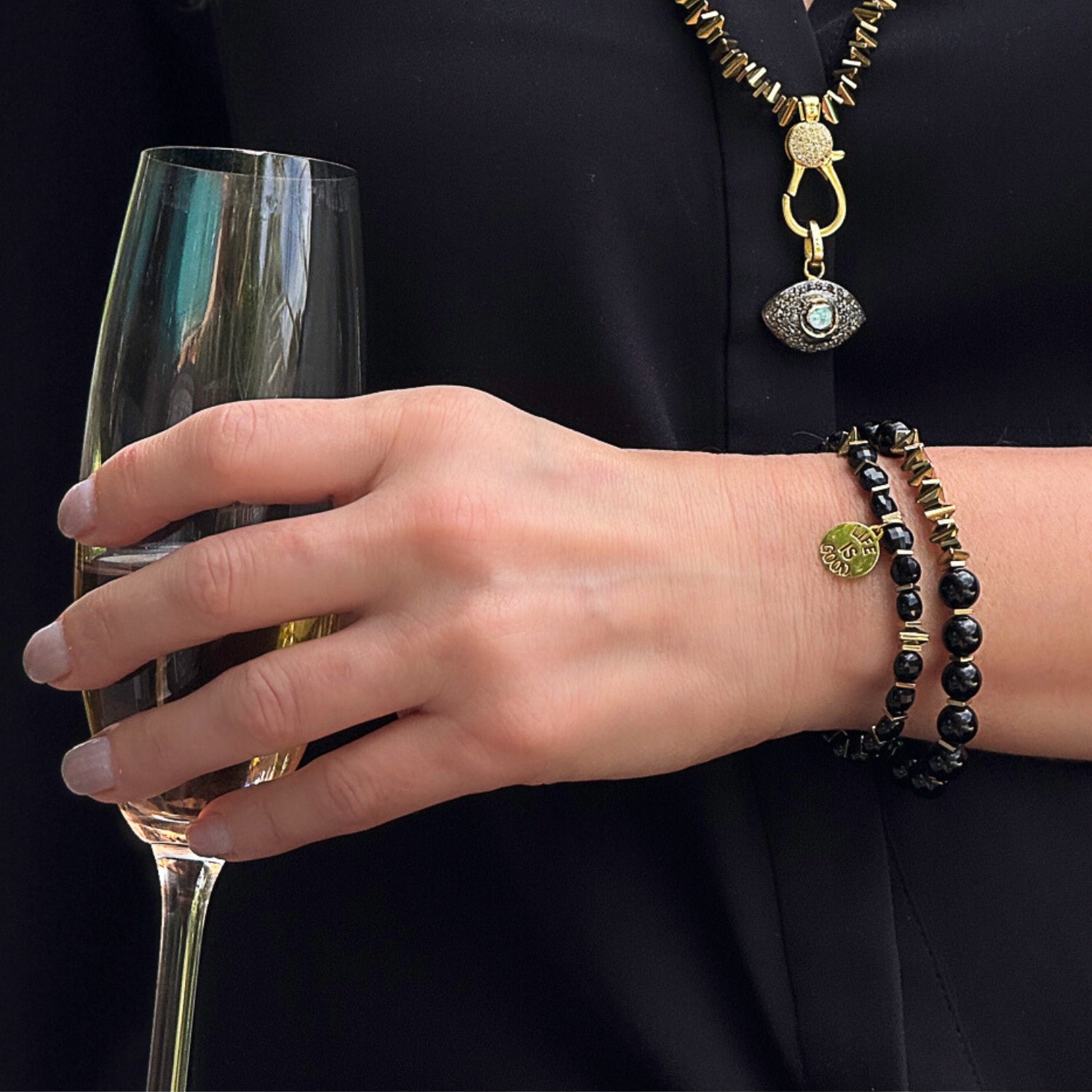 Day to Night Radiance: Versatile Black Onyx Bracelet Set with Gold-Plated Details