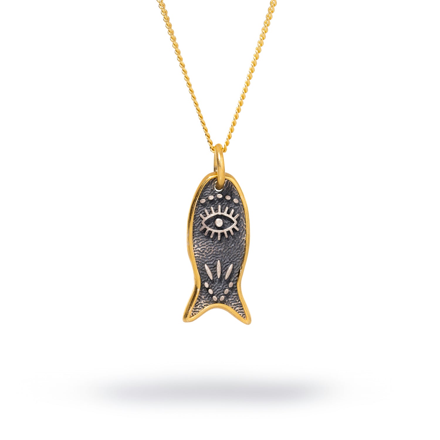 Sterling silver necklace featuring a lucky fish pendant with an evil eye symbol, framed in 18k gold plating for protection and luck.