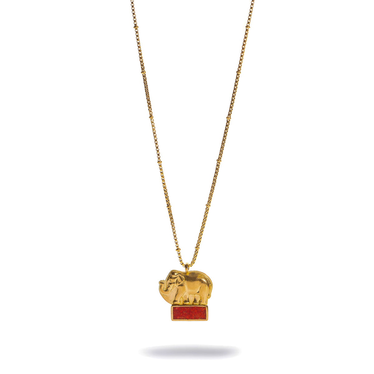 Full length view of the Lucky Elephant Red Coral Gold Pendant Necklace showing the box chain and the pendant