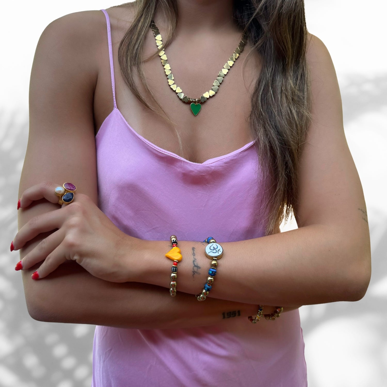 Model Wearing Timeless Om Mantra Bracelet with Gold Hematite Stones