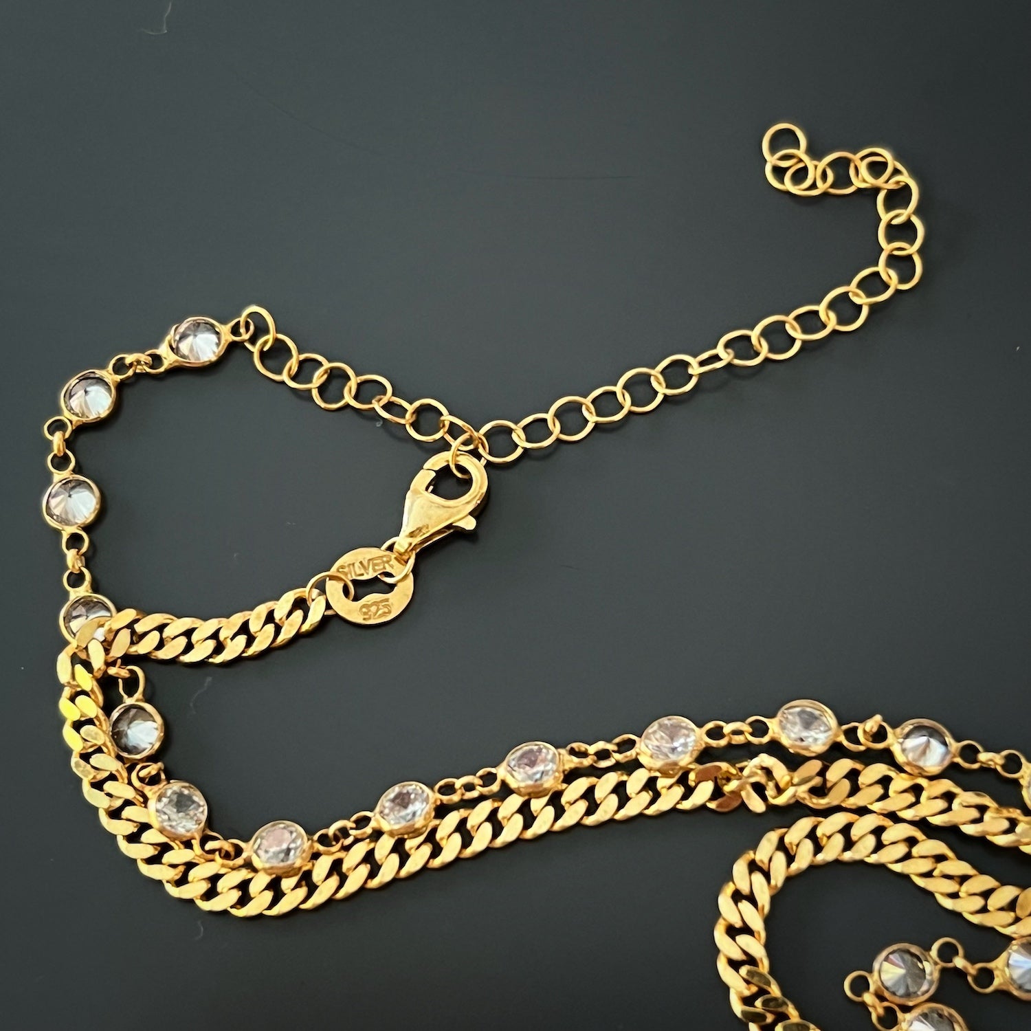 the Panther Gold Chain Necklace, showcasing its choker length and adjustable size for a comfortable fit.