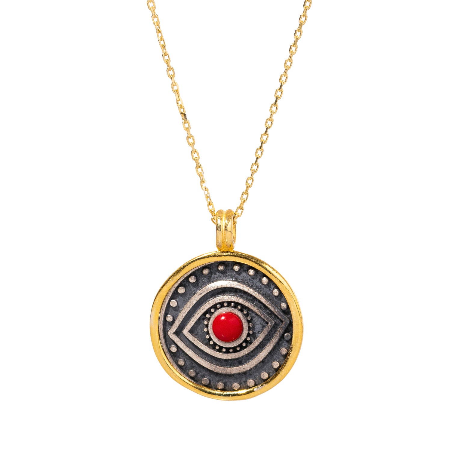 Striking sterling silver necklace with a red coral evil eye pendant encircled by dot symbols and a gold-plated frame, offering protection and strength.