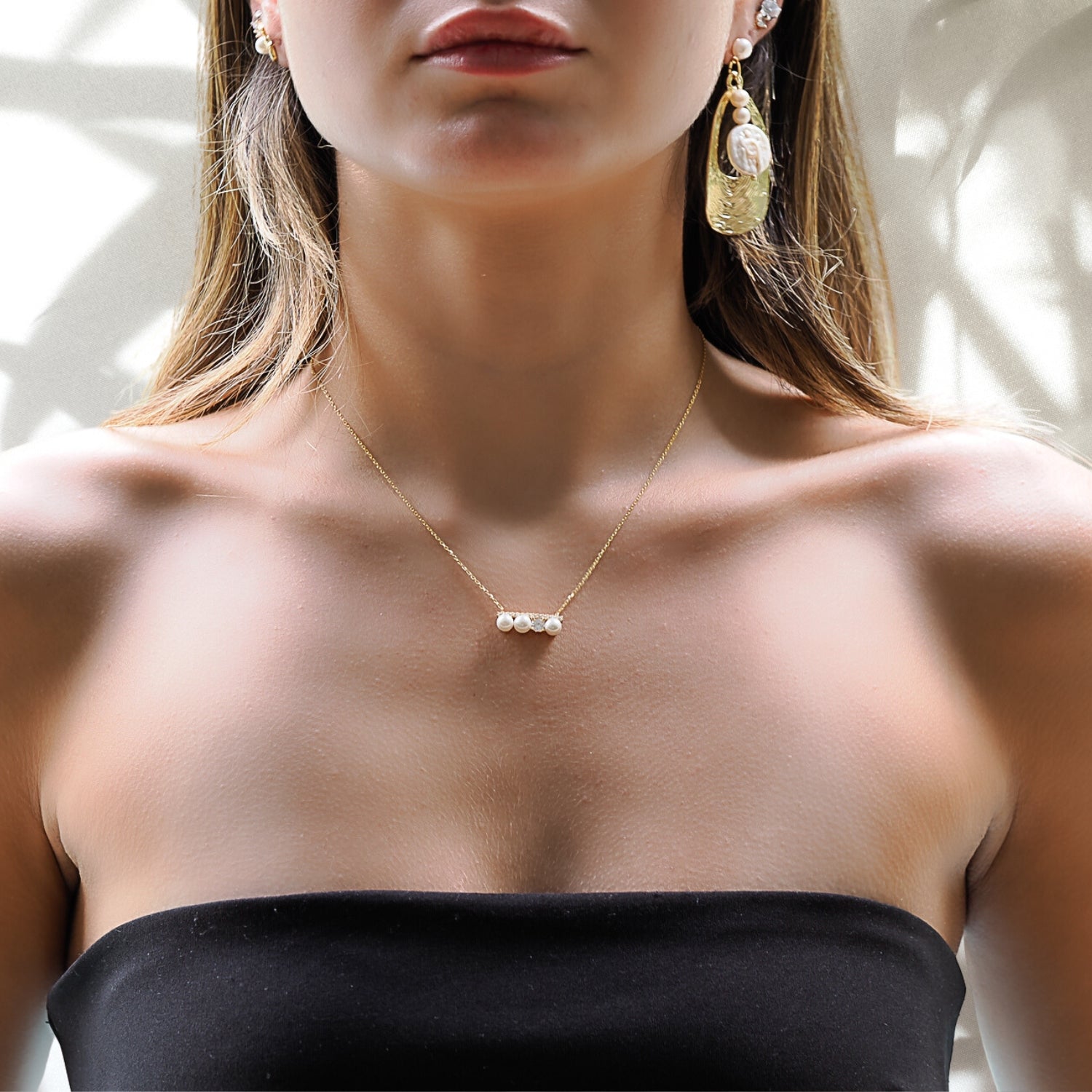 Model Wearing Pearl &amp; Diamond Gold Necklace - Timeless elegance on display.
