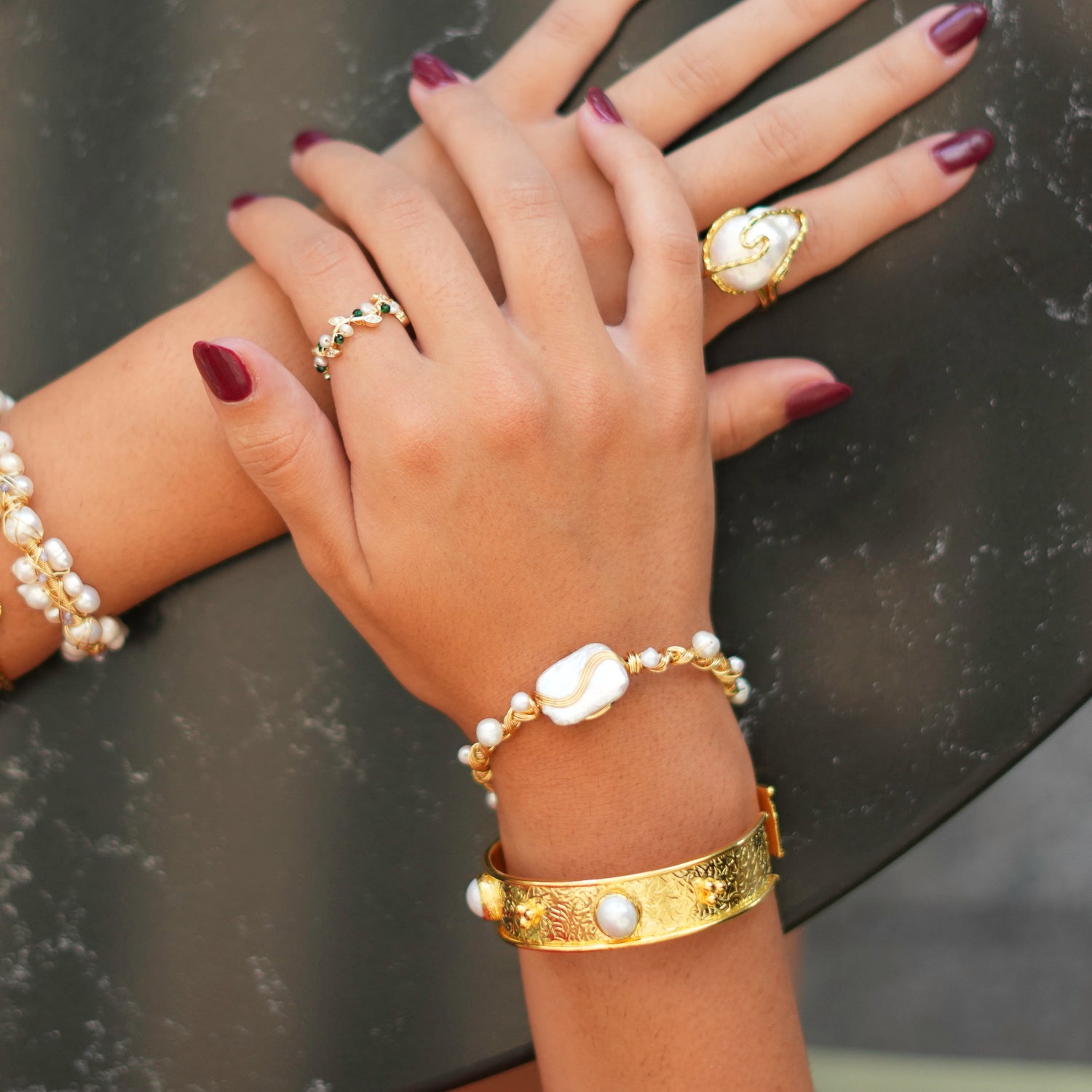 Boho Chic Gold Cuff Bracelet with Pearl Stones and Antique Detailing for a Bold Fashion Statement
