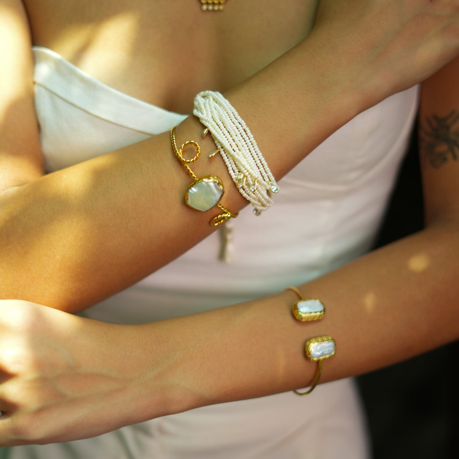 Gold Twisted Cuff Bracelet with Oval Pearl Stone for Timeless Royalty and Charm
