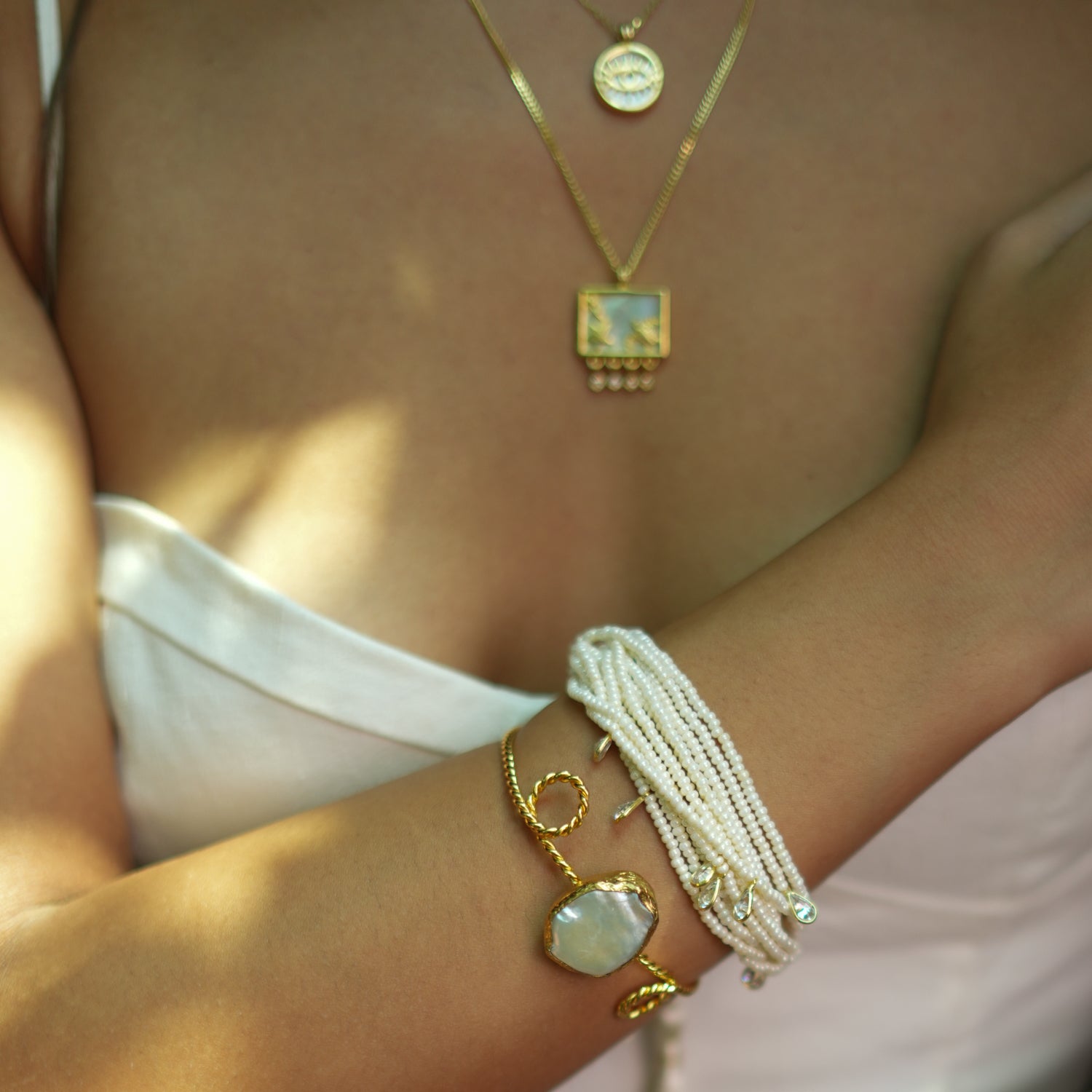 Handcrafted 24K Gold Cuff Bracelet with Twisted Design and Pearl Stone for Mystical Elegance
