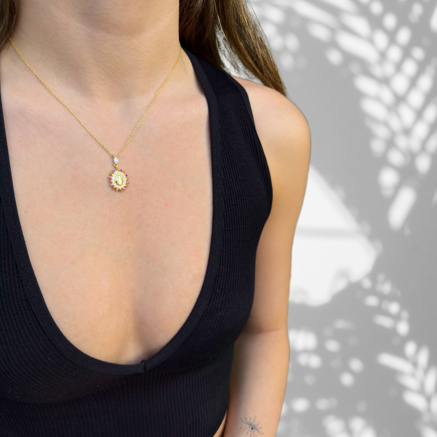 Devotional Virgin Mary Pendant Necklace with intricate sterling silver craftsmanship.