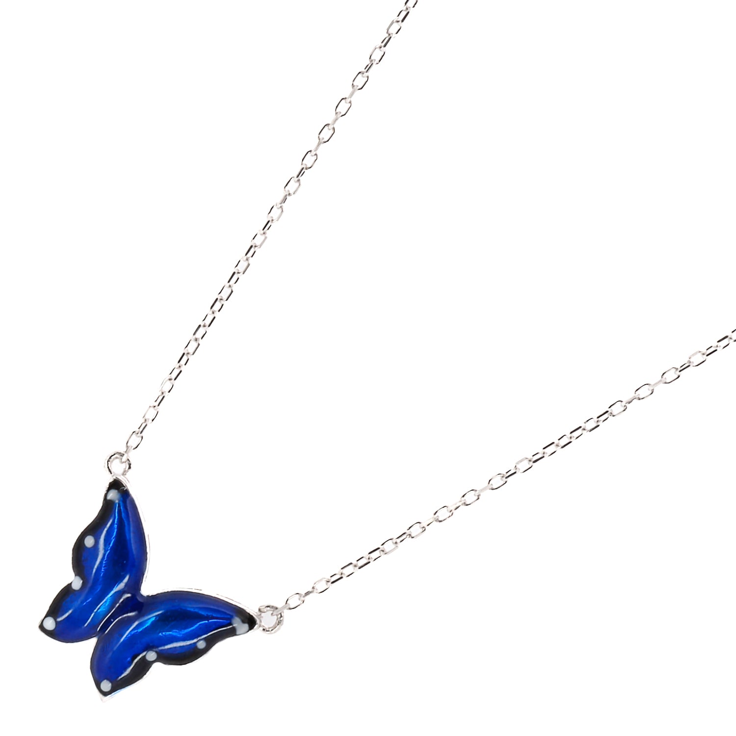 Stylish shot of the Silver Spiritual Blue Enamel Butterfly Necklace, adding a touch of spirituality and elegance to any outfit.