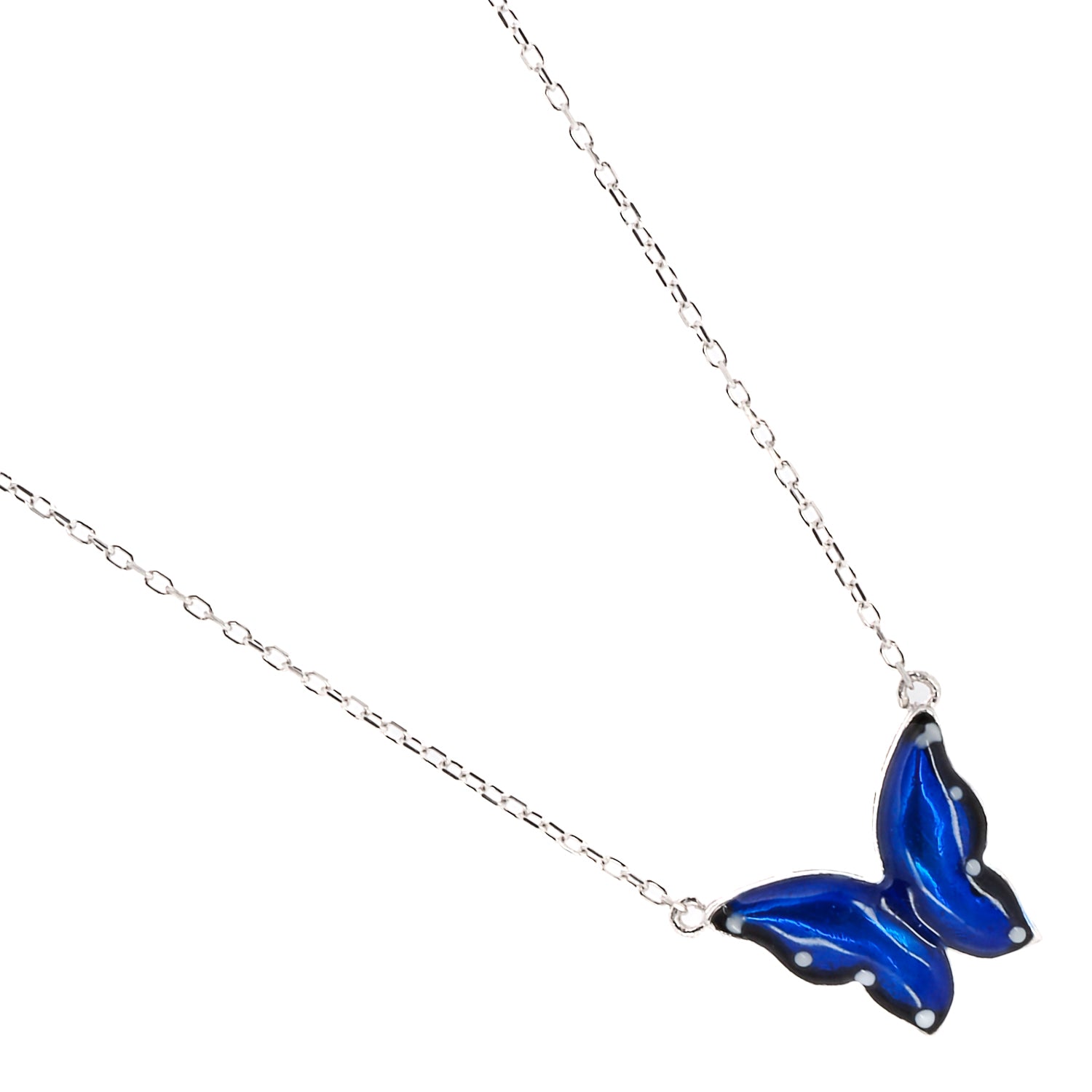 Silver Spiritual Blue Enamel Butterfly Necklace, a handmade piece of jewelry that inspires spiritual growth and self-transformation.