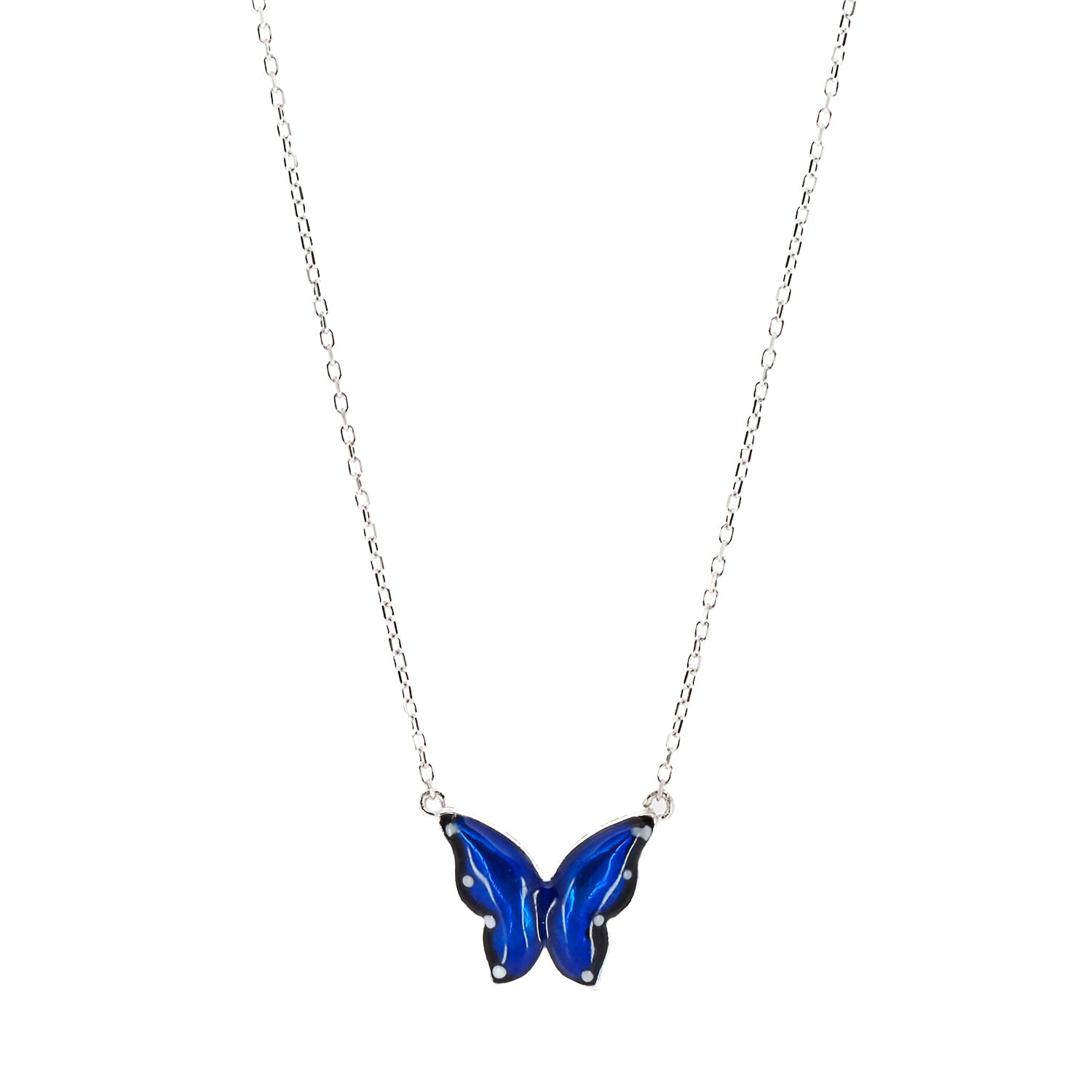 Close-up shot of the intricate blue enamel design on the butterfly pendant, symbolizing transformation and spiritual growth.
