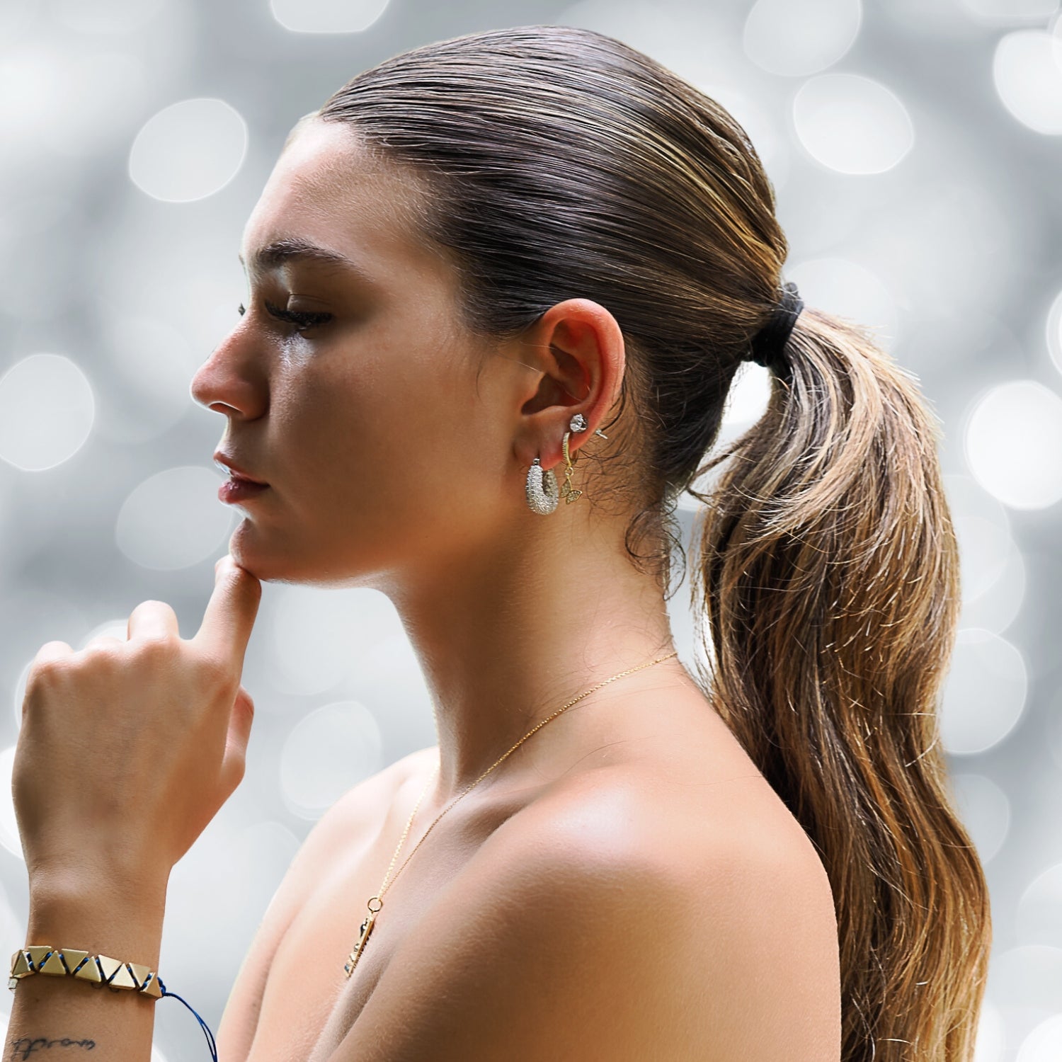 Sparkling silver earrings featuring pave-set CZ diamonds
