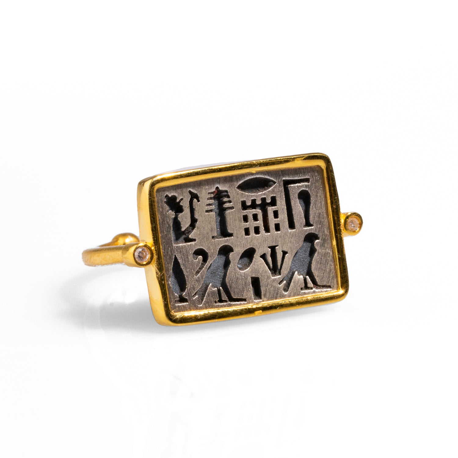 Rectangular sterling silver ring with intricate Egyptian symbols, framed with 18k gold plating, adjustable from size 5.5 to 9.