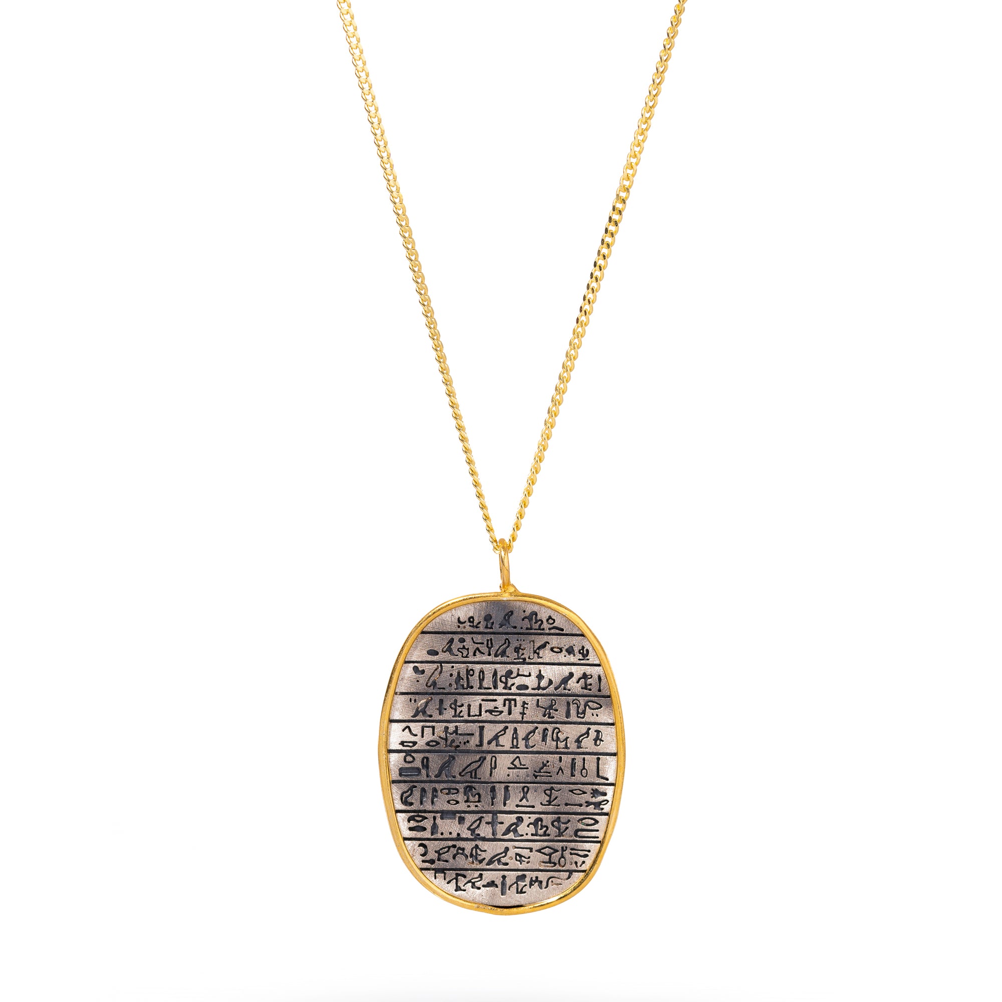 Gold and silver necklace with ancient Egyptian symbols, blending spirituality and modern design.