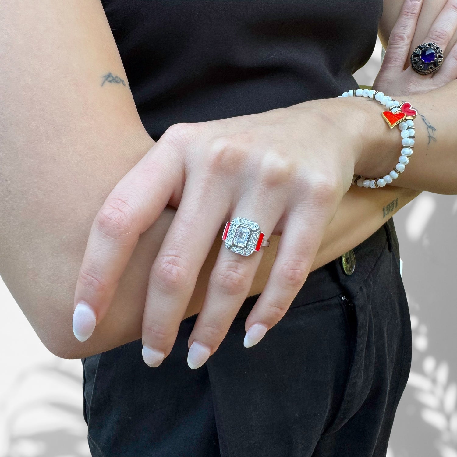 Contemporary Shine: Model Wearing Sterling Silver Red Enamel Pave Diamond Ring
