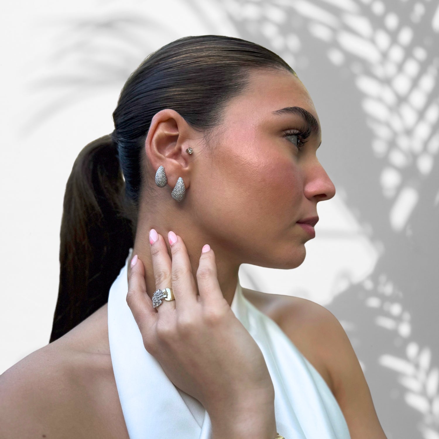 Close-up of Model Wearing Contemporary Pave Cz Diamond Earrings