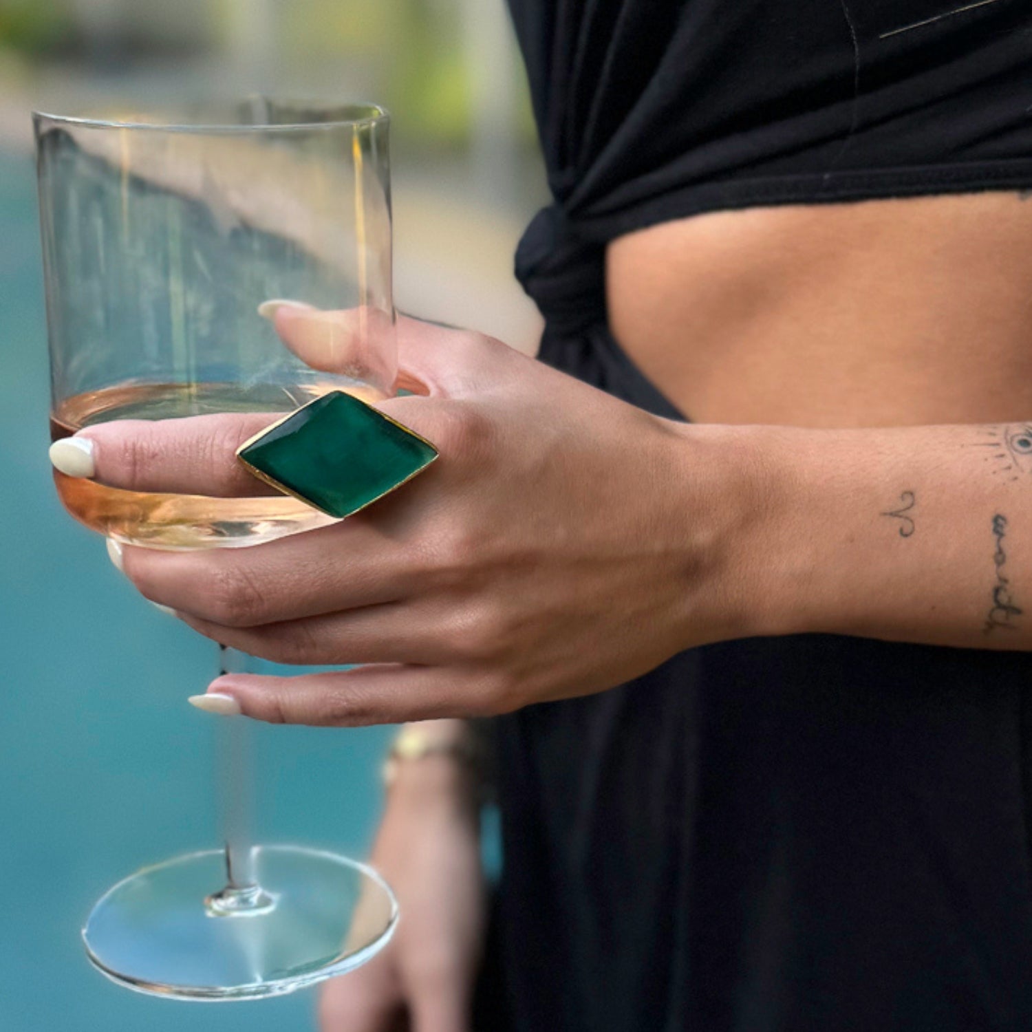 Stylish gold chunky ring with a vibrant green cat eye stone that mimics a cat’s eye slit