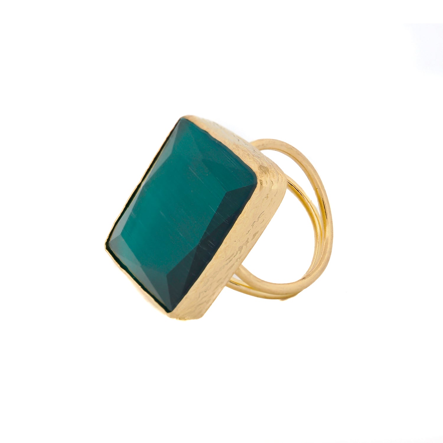 Green cat eye stone set in a luxurious gold-plated brass chunky ring, reflecting light dramatically