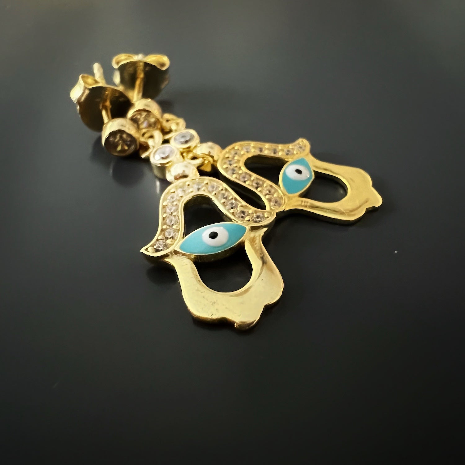 Stunning Turquoise Evil Eye Gold Hamsa Earrings, a perfect blend of style and spirituality