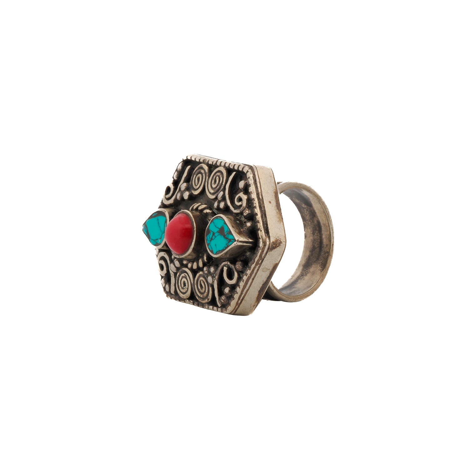 Handcrafted silver ring with a bold spiral pattern, adorned with turquoise and coral gemstones