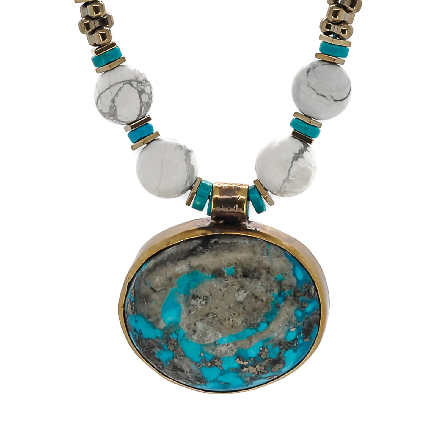 Unique vintage-style necklace with turquoise and white Howlite stones, capturing a harmonious blend of elegance and natural beauty