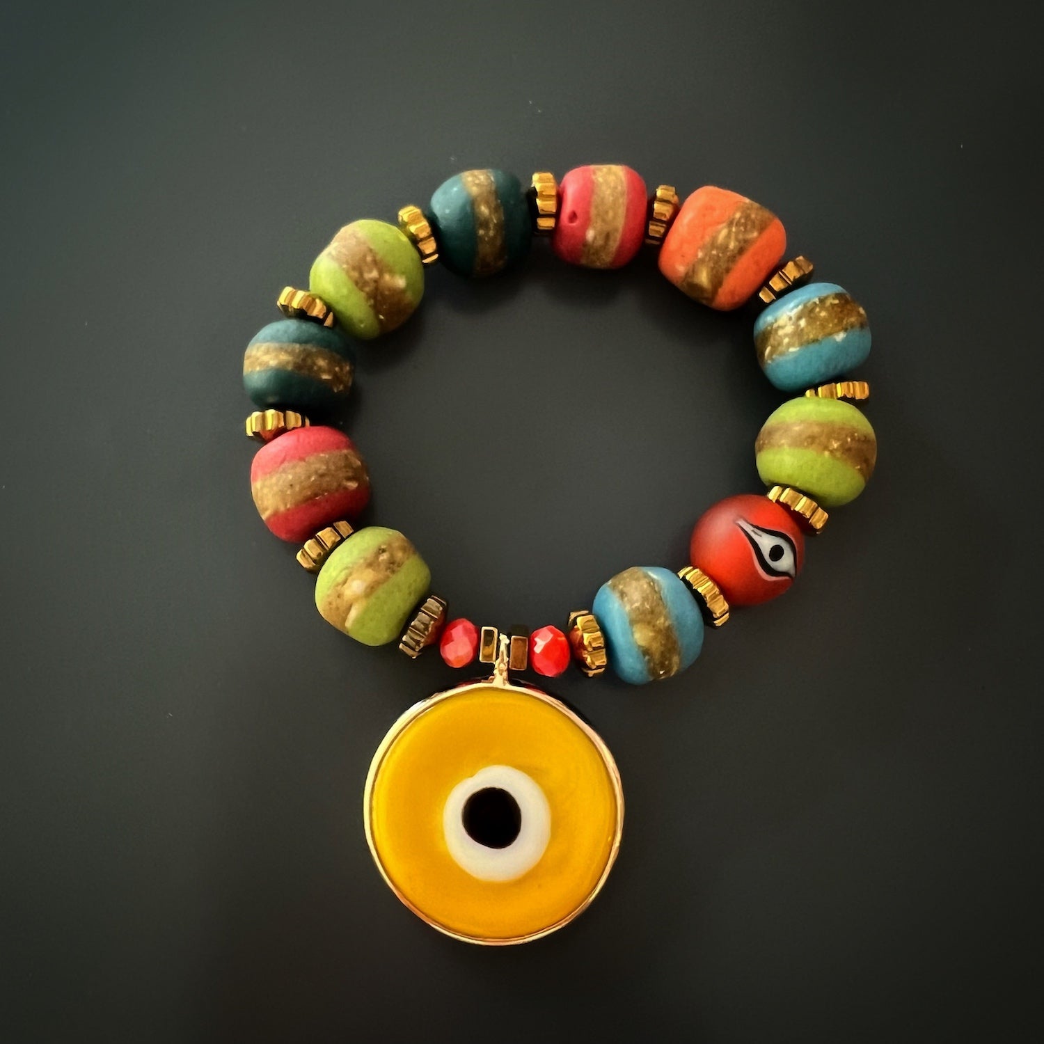 Find joy and positivity with the Yellow Evil Eye Carpe Diem Bracelet, a handcrafted accessory that reflects your vibrant and confident style.