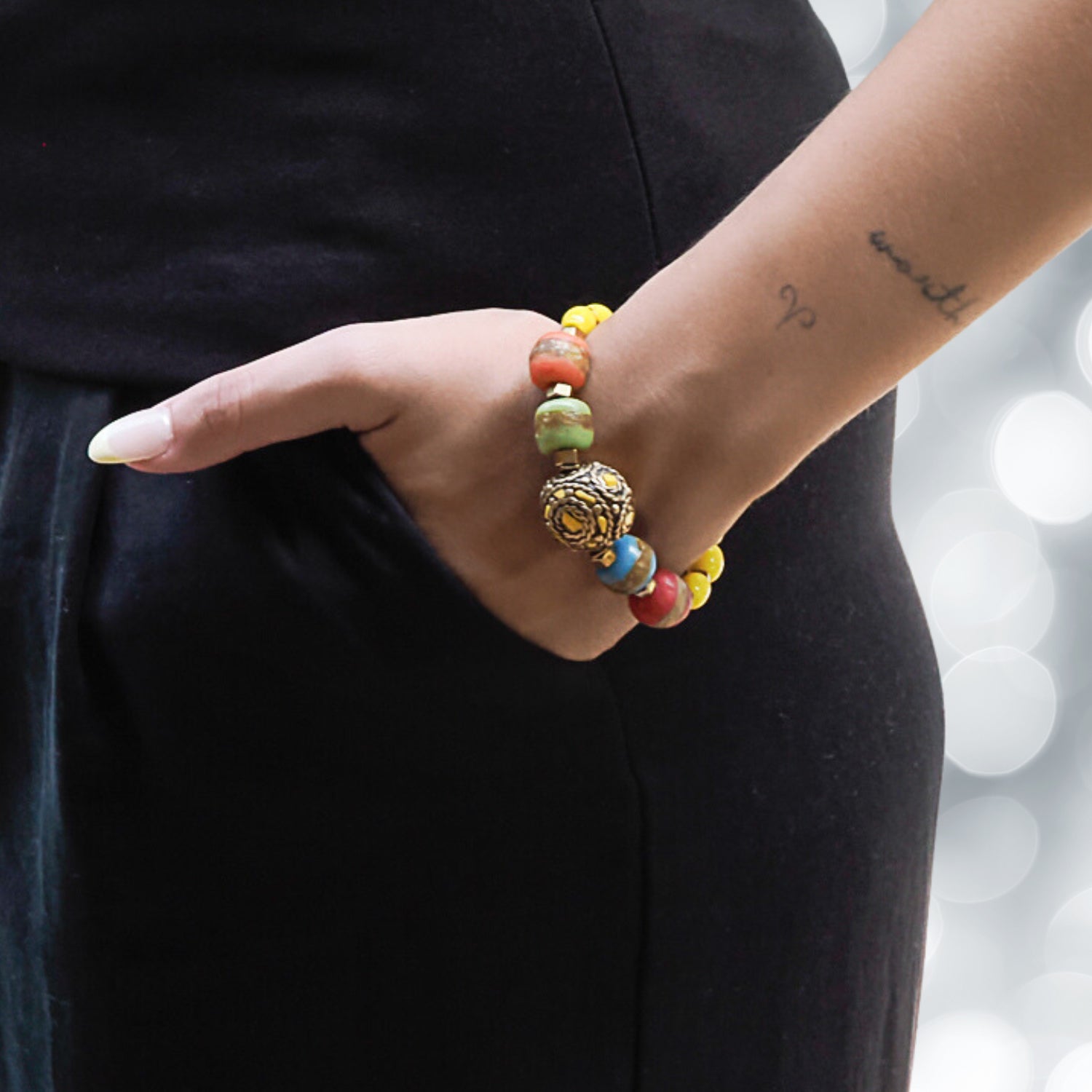 Model Wearing Yellow African &amp; Nepal Beaded Chunky Bracelet - A journey of vibrant energies.