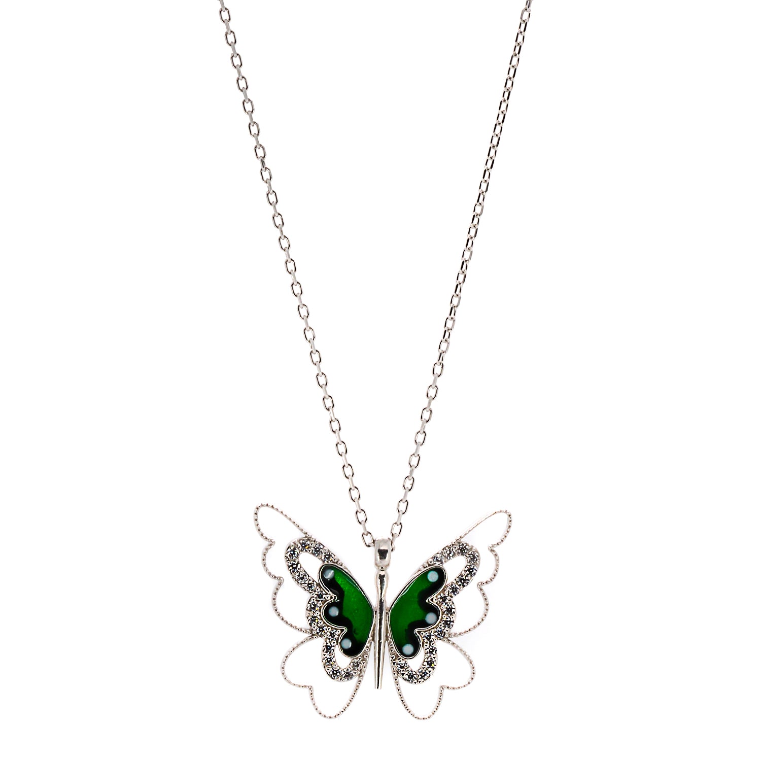 A close-up of the intricate green and black enamel design on the Abundance Green Butterfly Necklace.