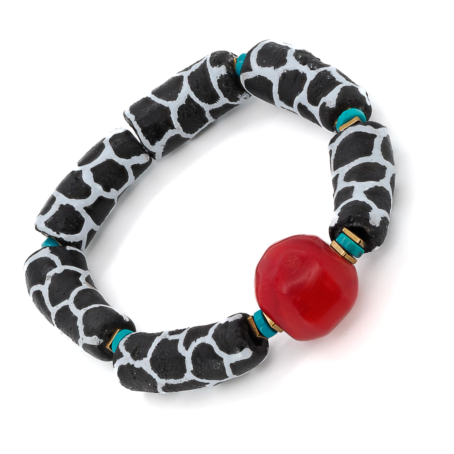 Detailed shot of the gold hematite spacers and turquoise stones placed between the zebra tube beads on the African Zebra Red Bracelet.
