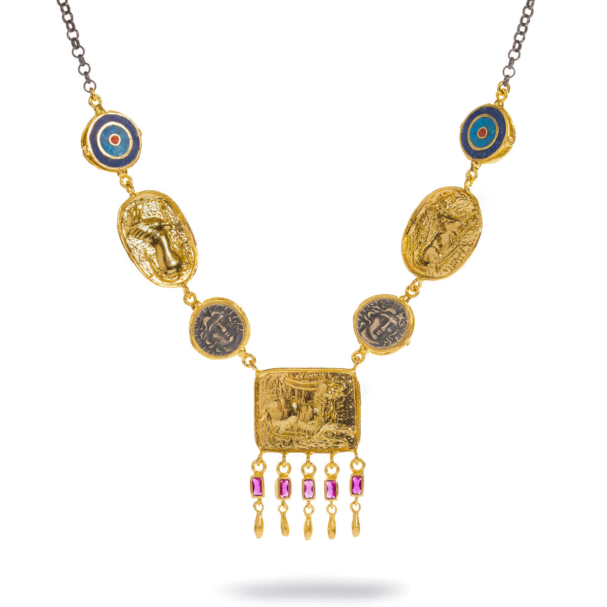 Amulet Gathering Evil Eye & Ruby Fringe Two Tone Necklace laid flat, lapis lazuli and coral inlay evil eyes, gold medallions and a plaque with a ruby baguette fringe