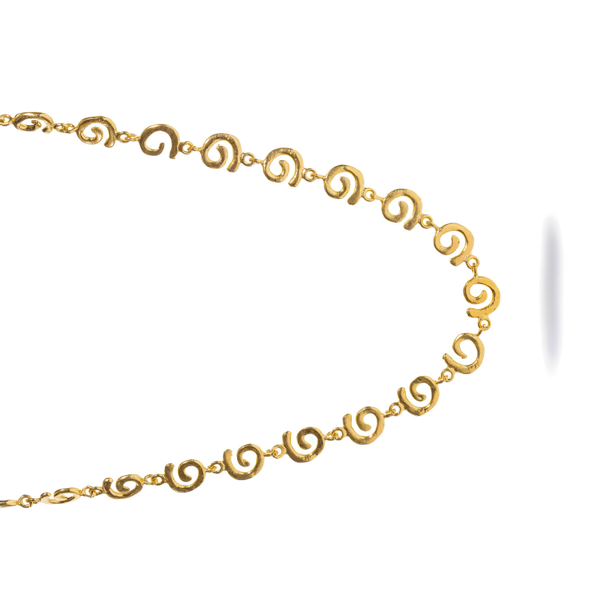 Detail of the Ancient Rhythm Spiral Gold Link Chain Necklace, hammered texture visible across the coiled spirals