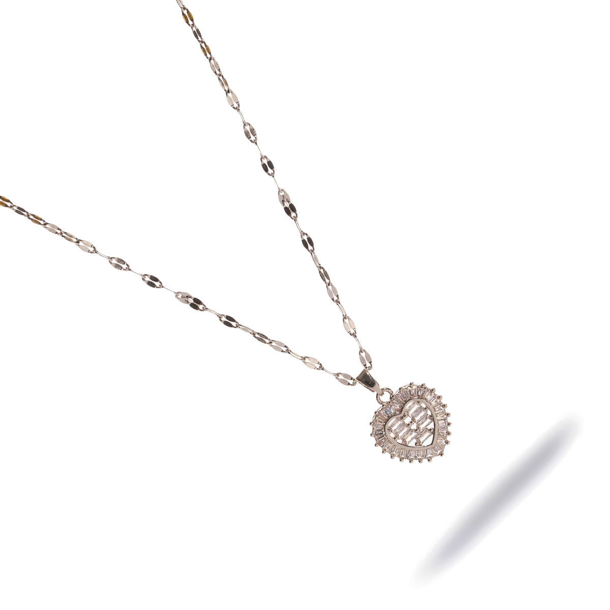 Polished stainless steel heart necklace with a tapered baguette halo, shown diagonally