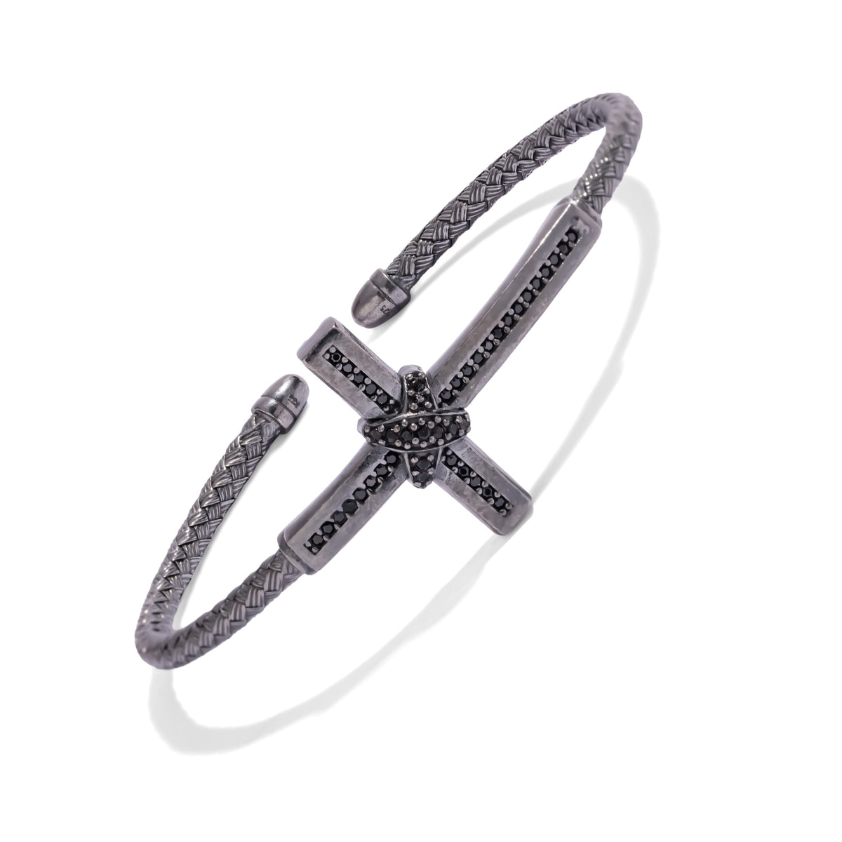 Side view of the men's oxidized sterling silver cross cuff with black zircon set along both beams