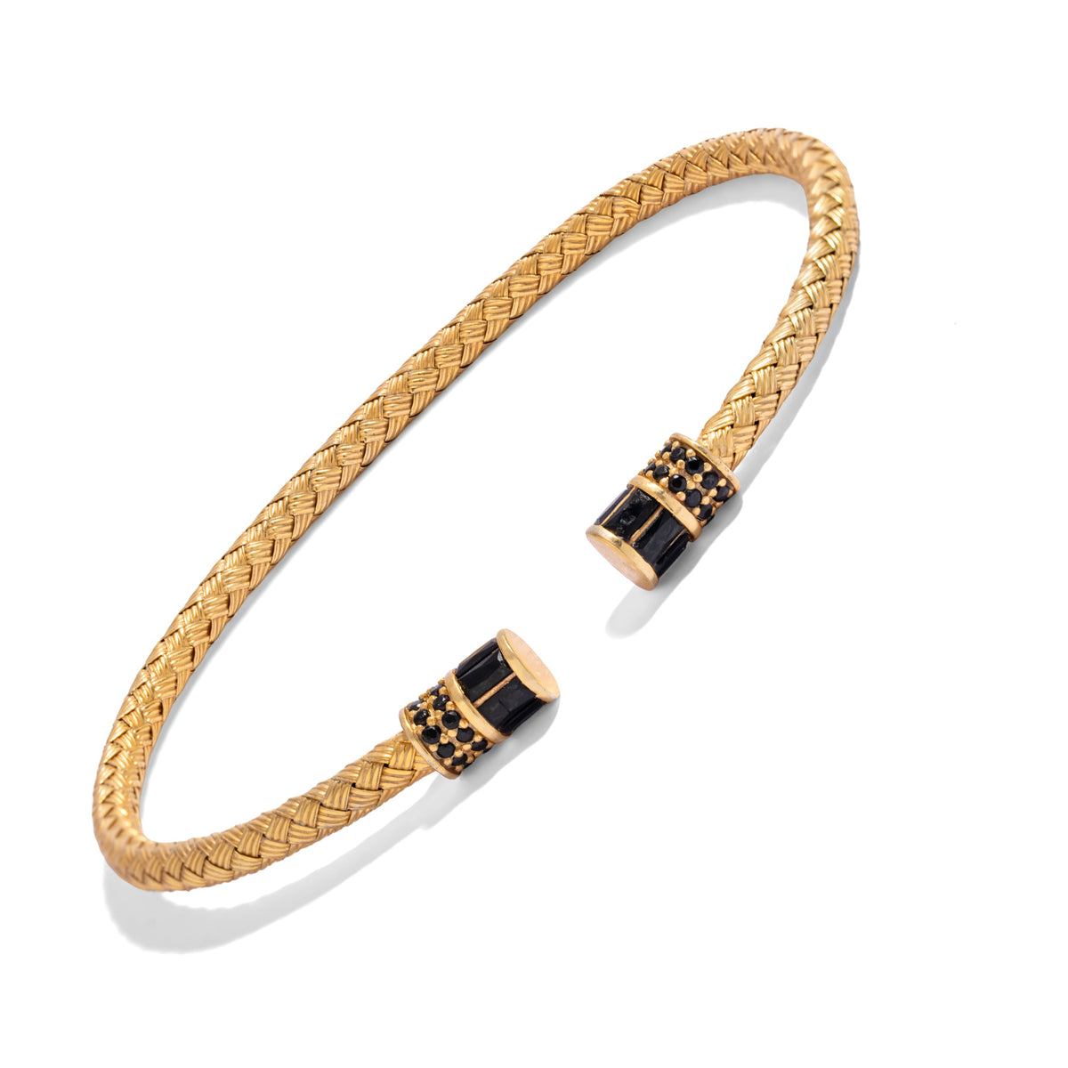 Woven gold vermeil open cuff bracelet seen from above, the black barrel end caps facing each other