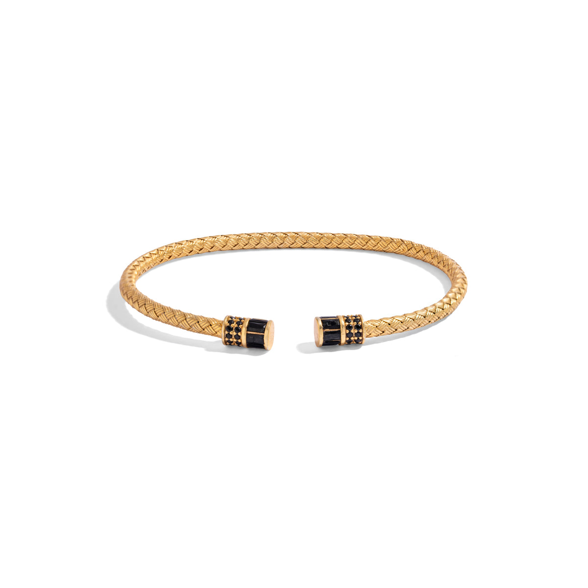 Front view of the slim woven gold vermeil men's cuff with black barrel end caps