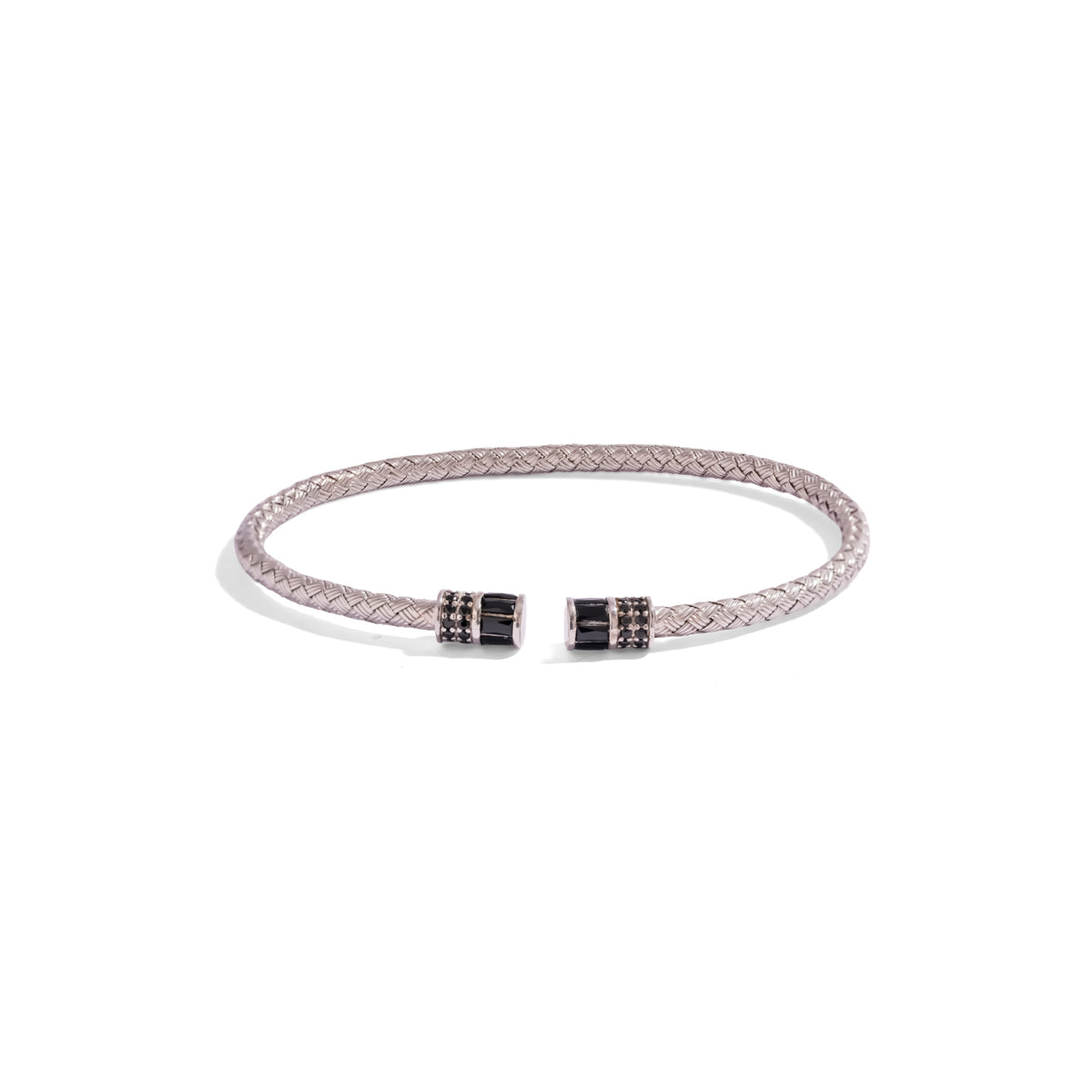 Black barrel end woven sterling silver cuff bracelet on a white background, front view