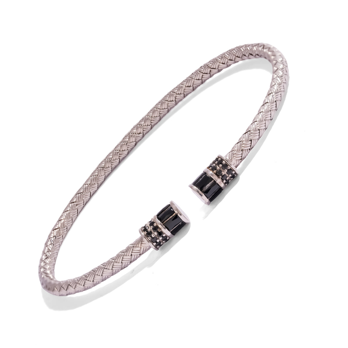 Side view of the slim woven sterling silver men's cuff bracelet and its black pavé barrel caps