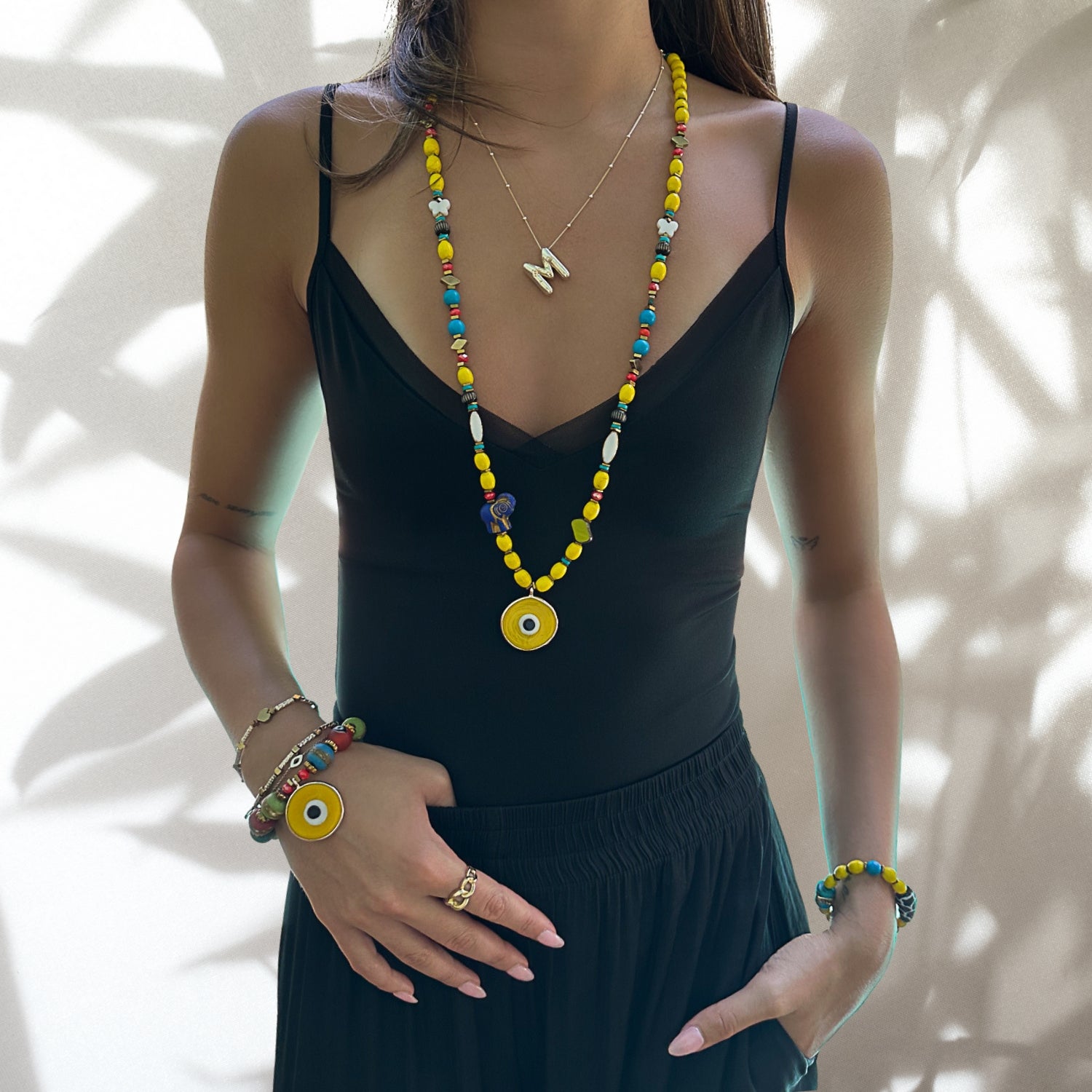 Model wearing the Carpe Diem Necklace, exuding confidence and embracing the moment.