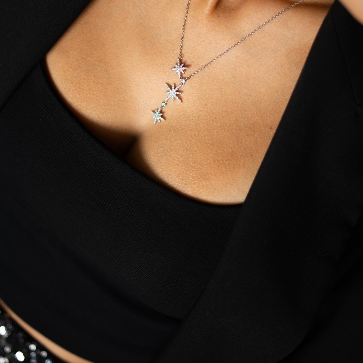 Triple star charm silver necklace with glittering details