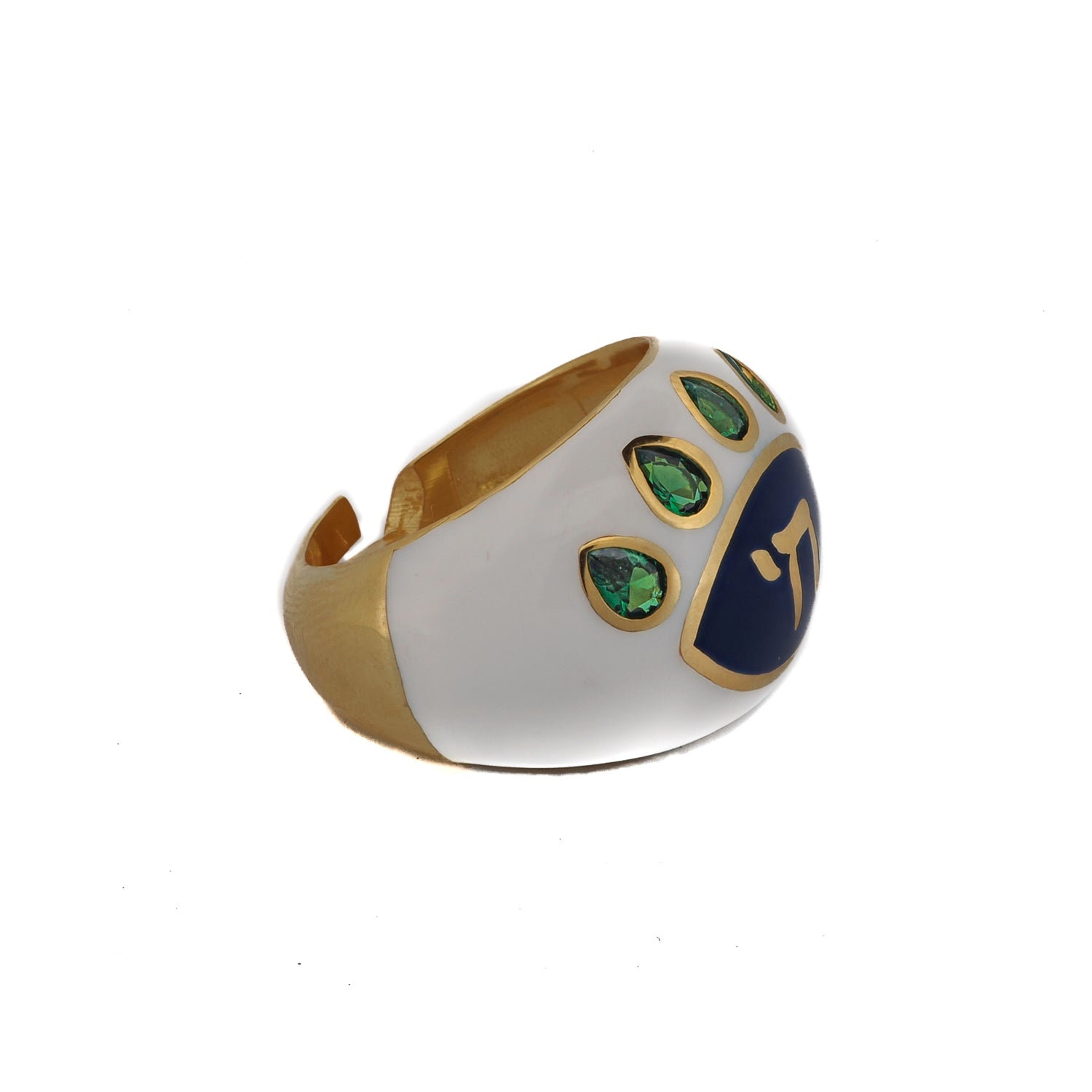 Chai symbol ring with a striking protective eye motif, handcrafted with white enamel and green emerald accents.
