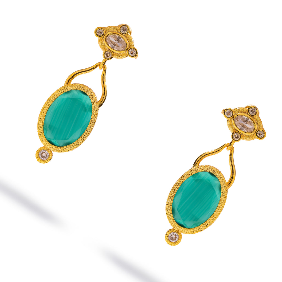 Pair of Cleopatra Emerald Cat Eye Gold Drop Earrings at an angle, curved gold loops and a zircon below each stone