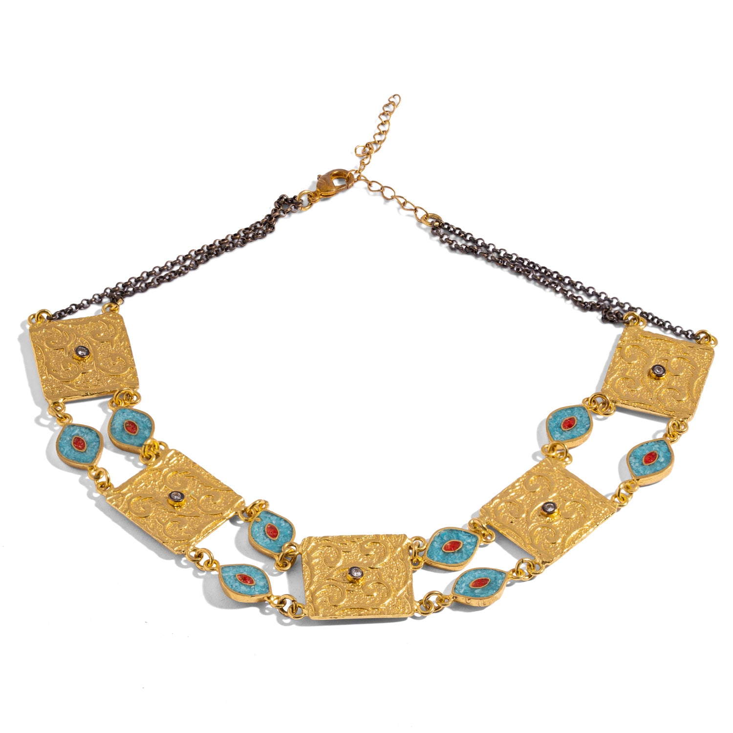 Cleopatra Evil Eye Turquoise & Coral Engraved Gold Collar Necklace laid flat, five engraved gold plaques linked by turquoise and coral inlay evil eyes on a darkened chain