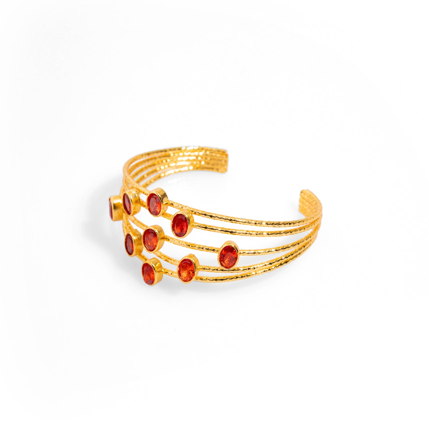 24k gold-plated chunky cuff bracelet with five gold wires and oval carnelian stones, offering a sophisticated and adjustable fit.
