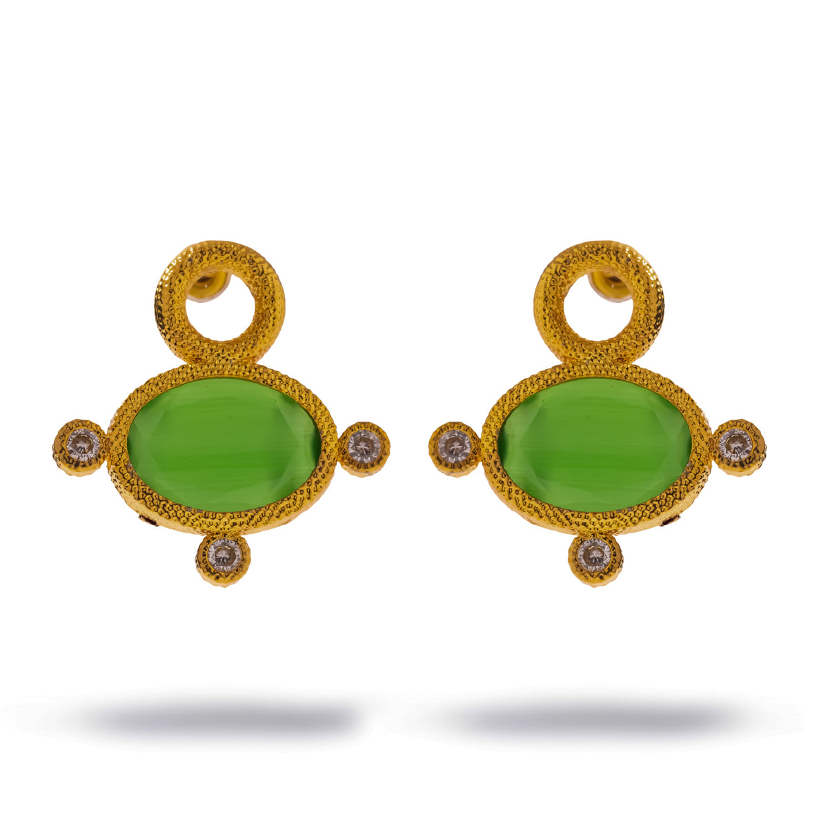 Cleopatra Green Cat Eye Gold Statement Stud Earrings on white, oval green stones framed in textured gold