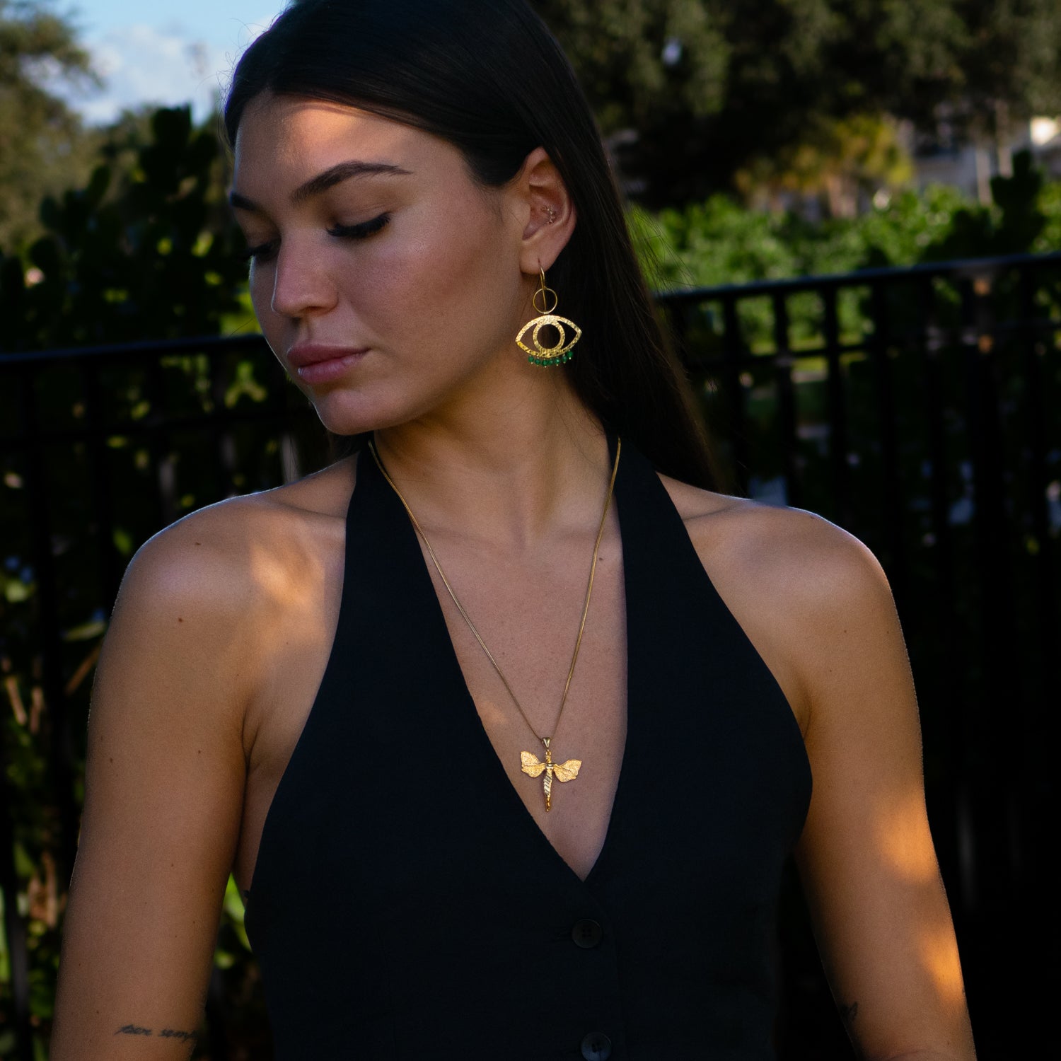 Green jade drop earrings handcrafted from 925 sterling silver, plated with 18k gold, featuring Cleopatra-inspired eye motif