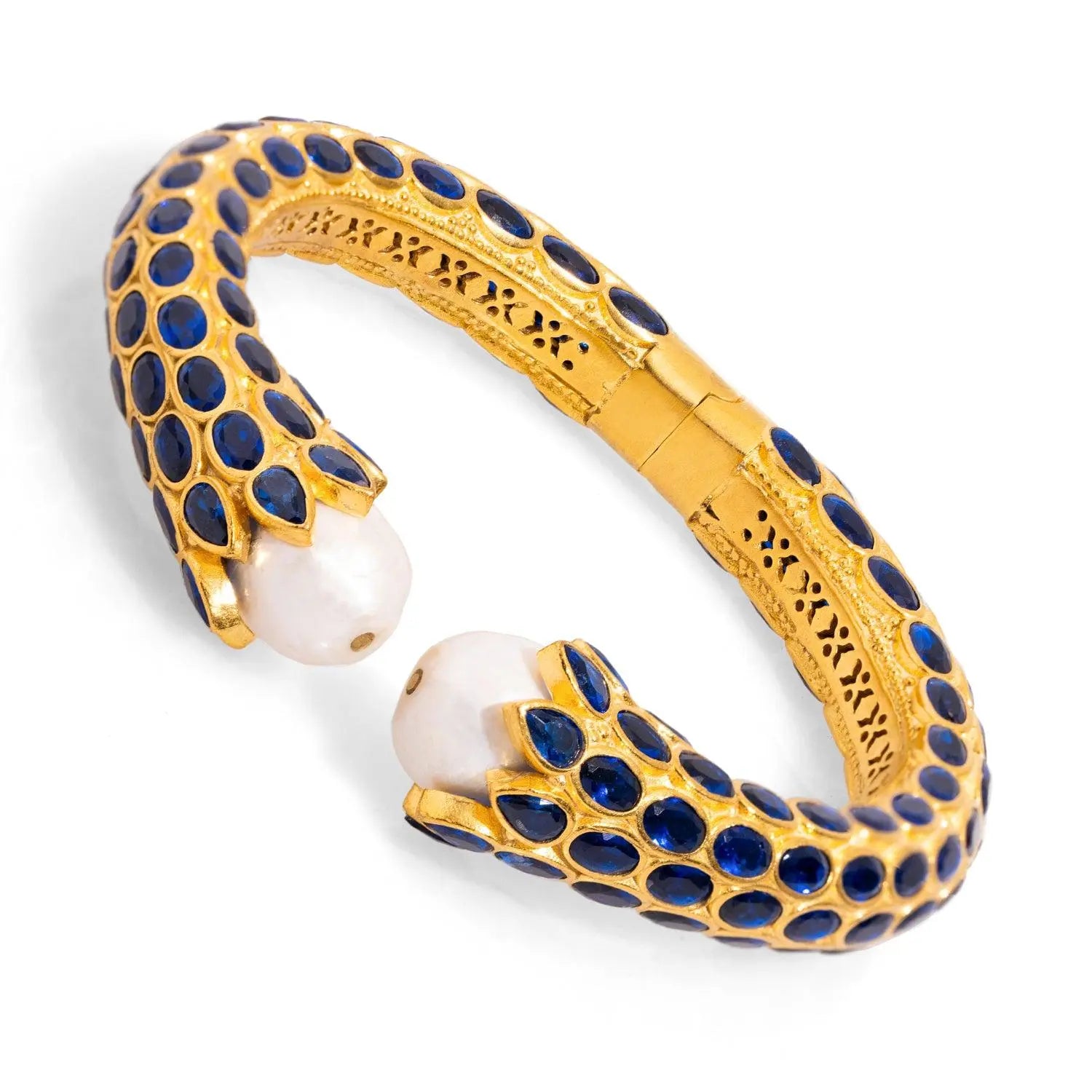Handmade Cleopatra-inspired gold cuff bracelet with sapphire and pearl stones, adjustable for a perfect fit.